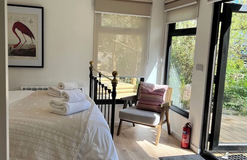 Gweek Cabina | The Mill Lodge luxury and cosy in a tranquil garden setting.