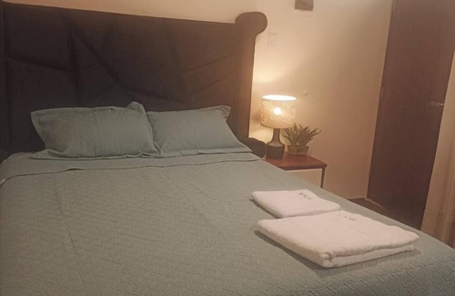 Puno Casa | Cozy room with TV and private bathroom