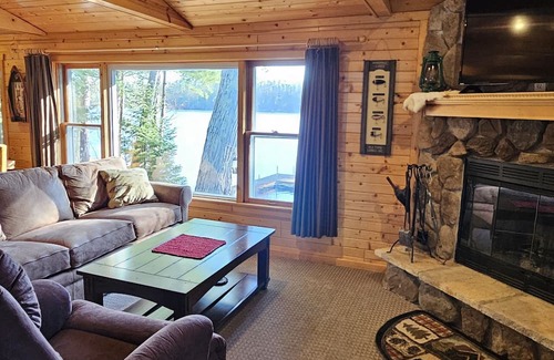 Elcho Cabaña | Cozy waterfront cottage on Lower Post Lake. Family- friendly.