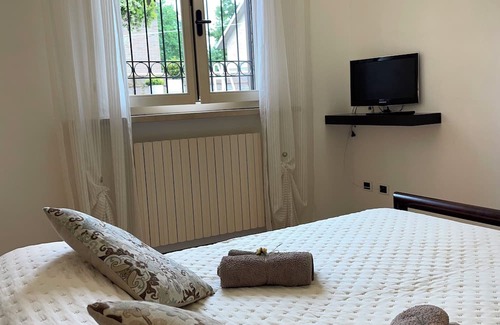 Ferrara Apartamento | Elegant flat 5 min from the centre of Ferrara, with private garden and parking.