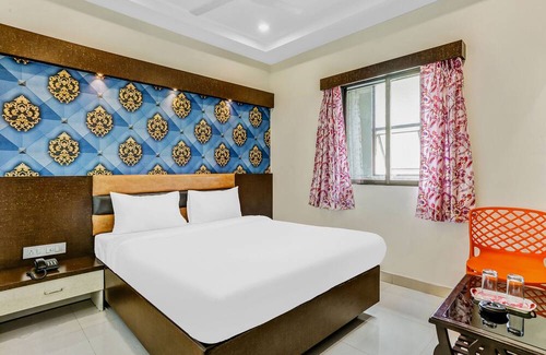 Nerul Hotel | Capital O Hotel Geeta Palace