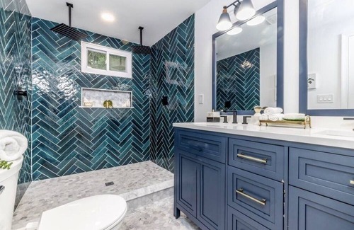 Mickleton Casa | Embrace the charm of our creekside haven featuring 4BR 3BA yoga and BBQ deck.