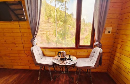 Fagu Cabaña | Family Room with Mountain View - Snowind Cottages