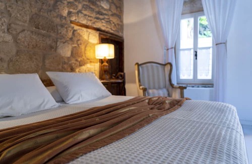 Lindos Cabina | Boho style luxury lodge with private courtyard in the heart of Lindos.