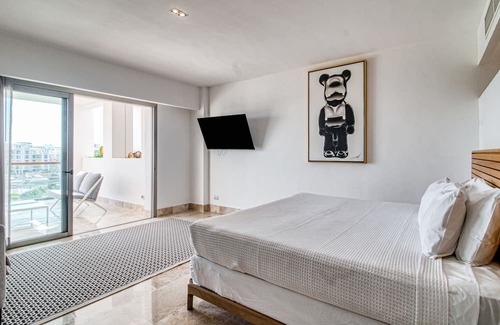 Playa Mujeres Apartamento | 4th-floor resort apt with outdoor pools, pool spas, tennis, gym, & balcony