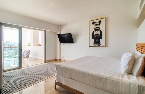 Playa Mujeres Apartamento | 4th-floor resort apt with outdoor pools, pool spas, tennis, gym, & balcony