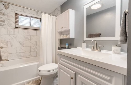 Columbus Casa | Newly remodeled home, spacious deck w/ string lights, & large yard with firepit