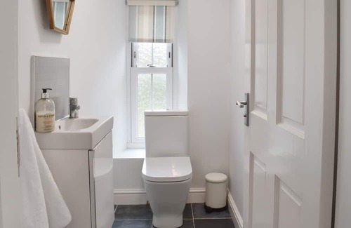 Arnside Cabaña | Belmont Apartment seamlessly combines modern comfort with timeless charm, providing a tranquil sanct