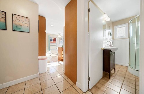 Pine Point Casa | Seaside Serenity: Charming 2BR Escape | Parking