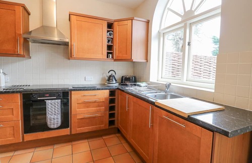 Tunstead Cabaña | THE COACH HOUSE, pet friendly, with pool in Stalham