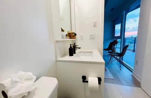 Wellington Place Apartamento | Waterfront Serene Heights