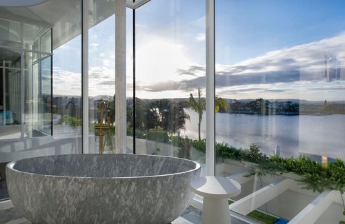 Mermaid Waters Villa | Architectural Masterpiece on Wide Water