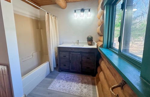 Pine County Cabina | Cozy log cabin located on a peaceful river near ATV trails and historic Duluth