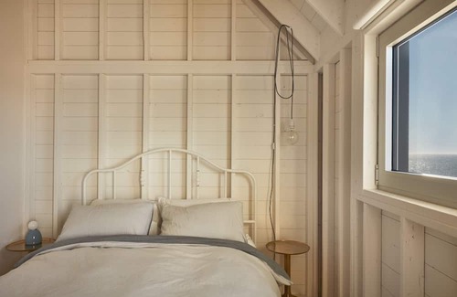 L'Ile-du-Havre-Aubert Casa | Prestigious home, recipient of many architecture awards, with three rooms