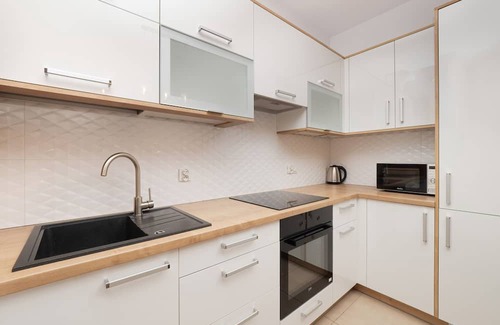 Baluty Apartamento | Apartment Manufaktura Łódź by Renters