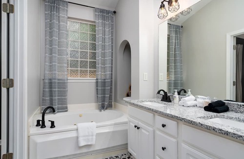Alabaster Casa | Enjoy a Gardenside Getaway - Fenced Yard & Patio