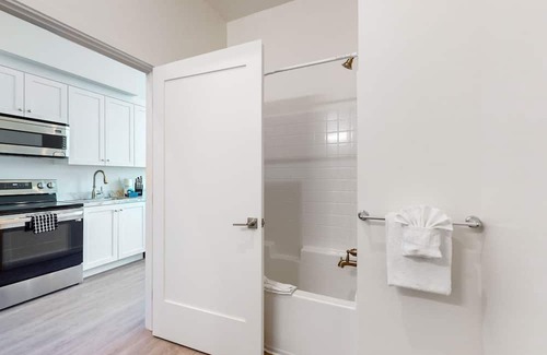 North Park Casa | Bright & stylish coastal getaway with game room & patio - near parks & golf