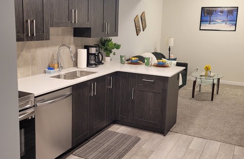 Calgary Casa | Cozy 2 bedroom newly built basement suite and 3 minutes walk to a beautiful lake