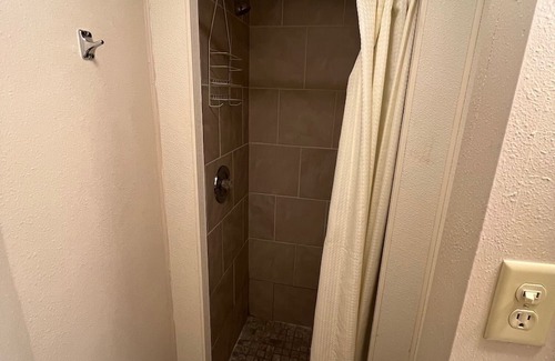 Onalaska Casa | Overlooking Lake Onalaska -- full-size bed + bath in nostalgic motel