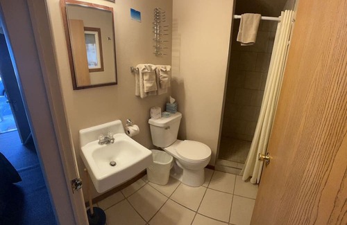 Onalaska Casa | Overlooking Lake Onalaska -- Two Queen beds + bathroom in nostalgic motel