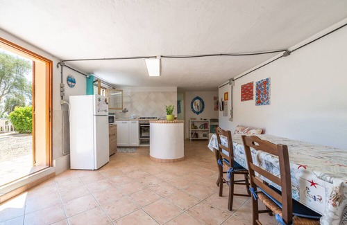 Sant'Antioco Casa | Holiday Home 'Fronte Mare Azzurro' with Sea View, Shared Garden and Wi-Fi