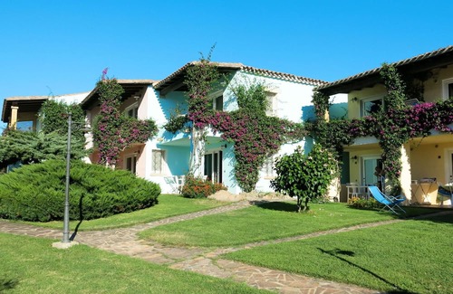 Porto Rotondo Apartamento | Lovely apartment for 2 guests with WIFI, pool, A/C, TV, terrace, pets allowed and parking