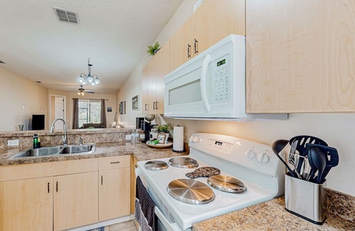 Haines City Casa | Townhouse near the lake with outdoor pool, hot tub, patio, streaming, W/D, & AC