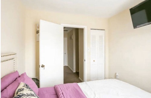 Wheaton Casa | Convenient Living: Walk to Metro TV in Bedroom. Ideal for a Restful Sleep
