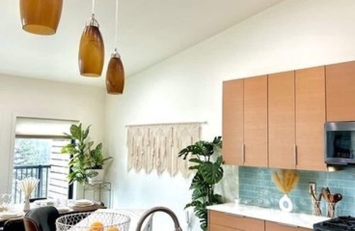 Spokane Casa | Urban Forest Boho Retreat with view