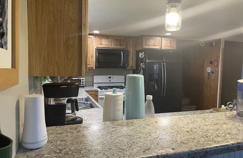 Pentwater Cabaña | Cozy 3-bedroom cottage, large yard, minutes from Lake Michigan. Pet friendly.