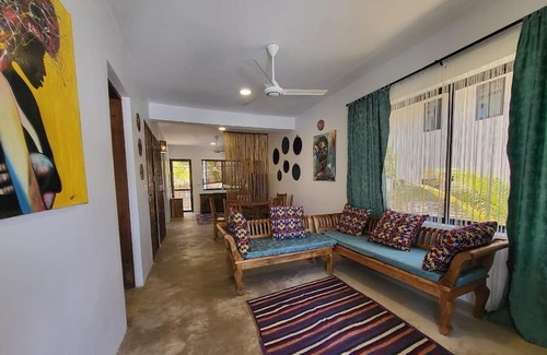 Bwejuu Beach Apartamento | SAND BEACH PALM RESIDENCE