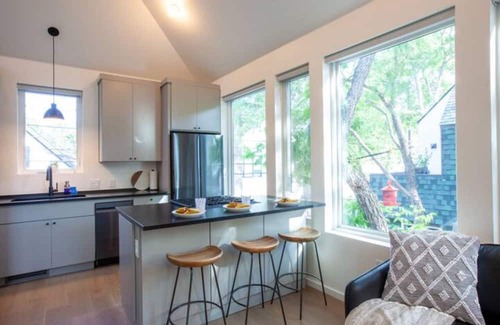 North Loop Casa | Stylish 3 story house. 3 patios. Central Austin.