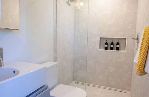 North Loop Casa | Stylish 3 story house. 3 patios. Central Austin.