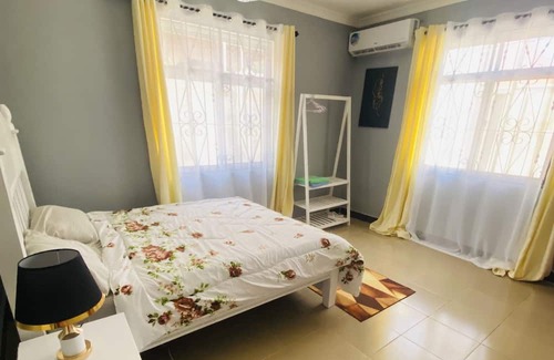 Dar es Salaam Apartamento | Cozy apartment that you can enjoy with your family. Pets freindly