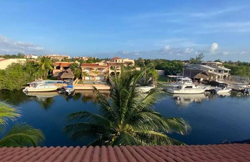 Puerto Aventuras Apartamento | Waterfront Tropical Apartment