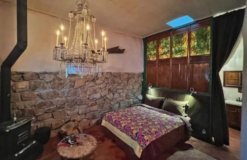 Cerrillos Casa | Romantic, Rock Carriage House, Hot Tub, WoodStove, on Historic Property