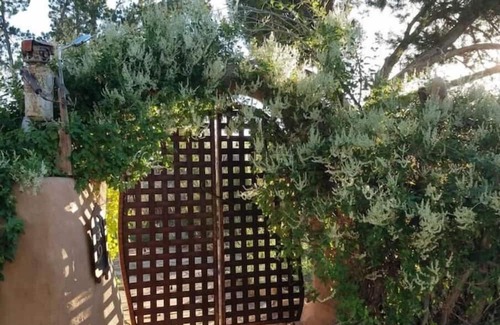 Cerrillos Casa | Romantic, Rock Carriage House, Hot Tub, WoodStove, on Historic Property