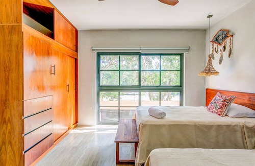 Centro de la ciudad de Tulum Villa | Nature-Chic Villa with Rooftop and Lap Pools!