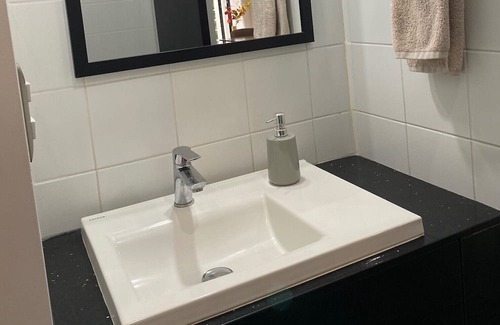 Zona 8 Apartamento | Luxury Cayala 2BR/2BA suite w/sunlit balcony near US Embassy, modern amenities.