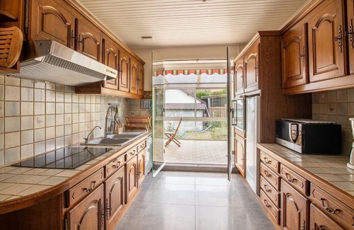Le Val-David Casa | Cozy and familiar vacation home with two terraces and fenced garden.
