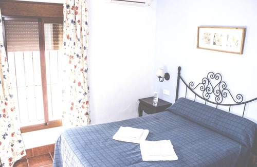 Estepa Casa | Homerez - Nice house for 4 ppl. with shared pool and terrace at Estepa