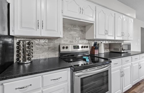 Joplin Casa | Stylish Rancher in Quiet, Tree Lined Neighborhood.