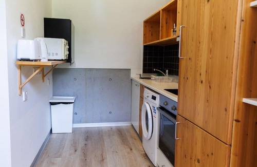 Pentakomo Apartamento | Eupraxia | Three-Bedroom Apartment, Art by PraXis Apartments