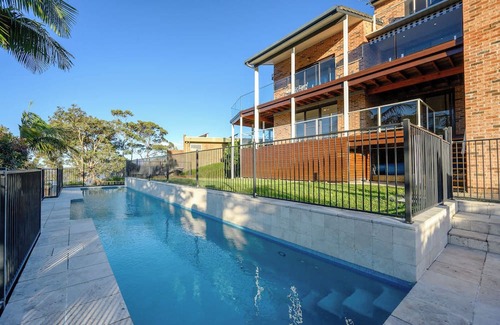 Tascott Casa | Coastal Luxury 2BR w Pool & Entertainer's Paradise