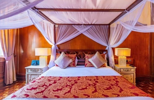 Limuru Hotel | Scenic Escape: Elegant Room Overlooking Lush Grounds