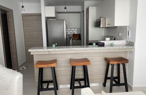 Veron Condominio | Chic 1-bedroom condo Pool, Balcony & Tropical Vibes.