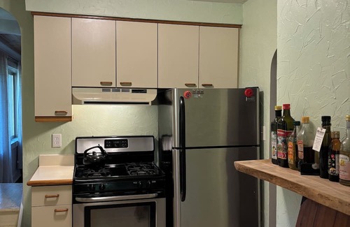 Level Green Cabaña | Rustic 2BR 1BA Cottage w Porch!