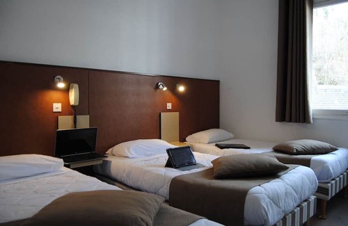 Lourdes Hotel | Serene Family Suite with Ample Space & Balcony - Free Parking