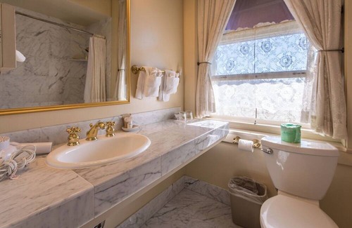 Santa Rosa Hotel | Sweet King Room with Private Bath + Period Furnishings Perfect for Getaways