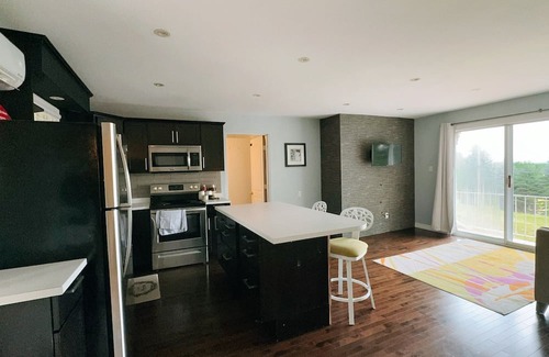 Moncton Villa | Modern Designer Villa Condo in Prime Location with Exclusive Amenities".